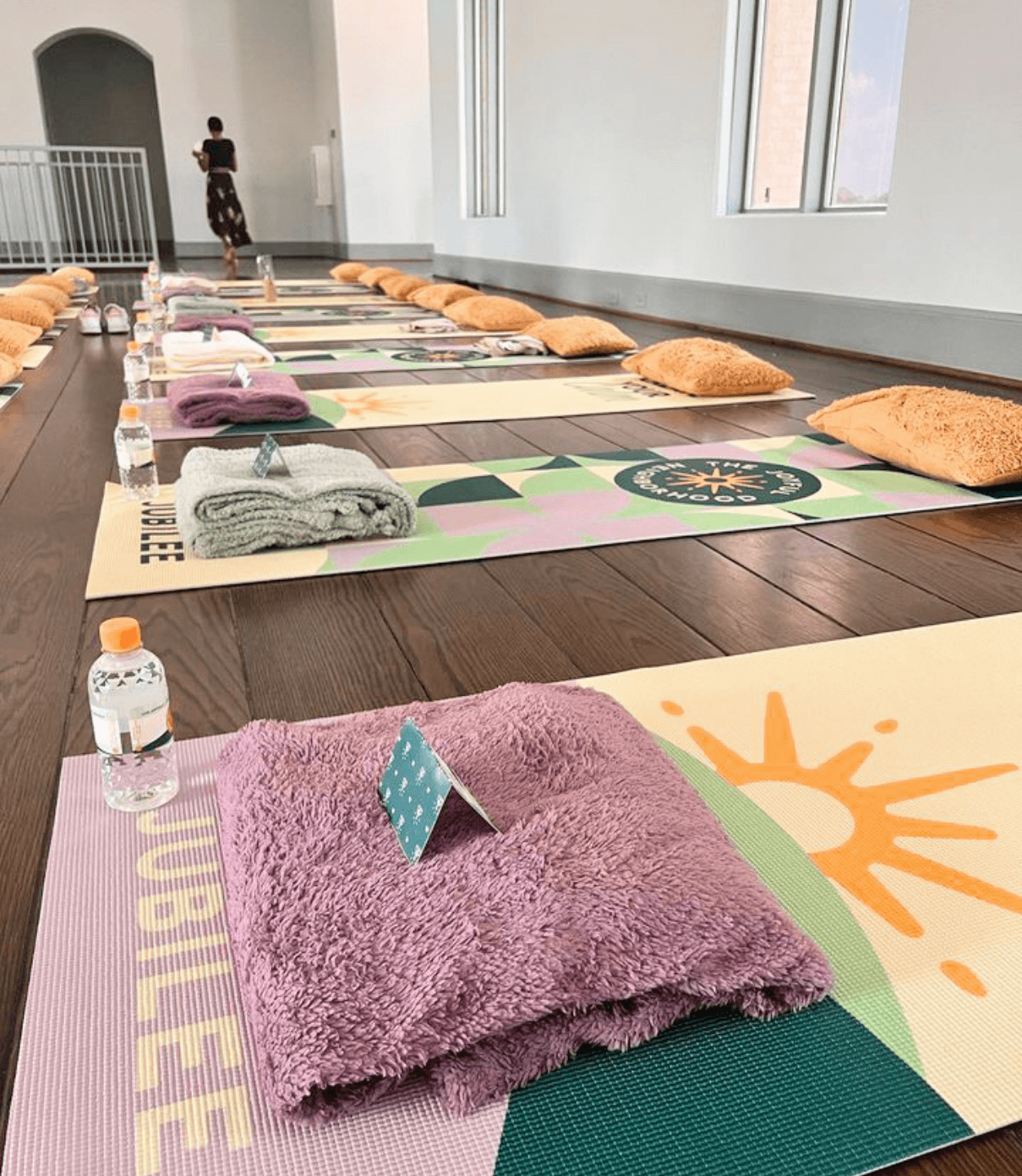 Branded yoga mats collateral for master planned community Jubilee designed by ST8MNT